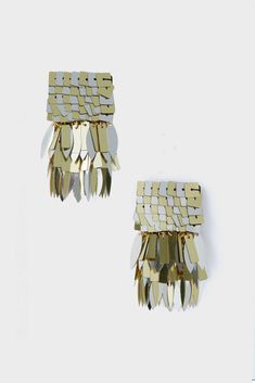 Silver and Gold Olsen Fringe Earrings Gold Fringe Metal Chandelier Earrings, Gold Fringe Chandelier Earrings, Metal Tassel Drop Earrings For Party, Glamorous Metal Tassel Earrings For Party, Glamorous Gold Fringe Earrings, Metal Fringe Earrings For Party, Party Fringe Metal Earrings, Gold Metal Tassel Earrings For Party, Party Tassel Earrings With Fringe