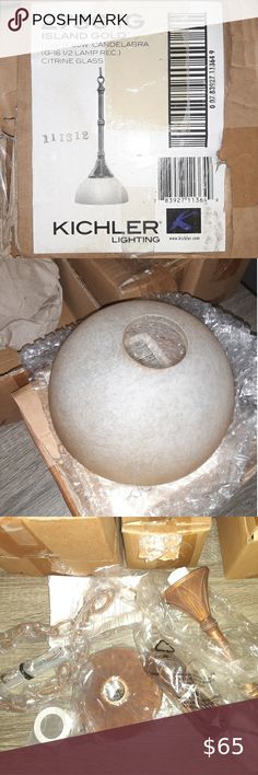 the inside of a box with a round object in it's center and some other items around it