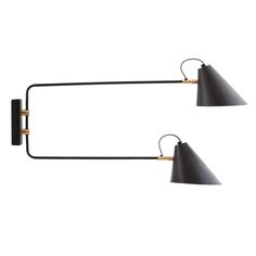 two black and brass wall lights with one light on each side, the other off