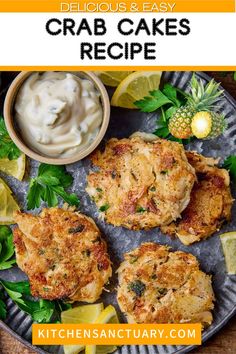 crab cakes on a plate with lemon wedges and sour cream in the background text reads delicious & easy crab cakes recipe