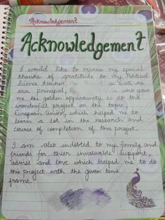 an open notebook with the words acknowledgement written in cursive writing