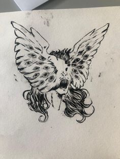 a drawing of a woman with wings on her head