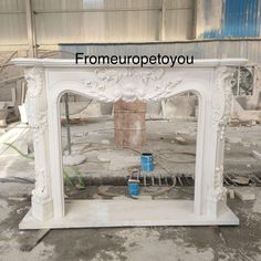 a white fireplace with some paint cans in front of it and the words promeupotoyou above it