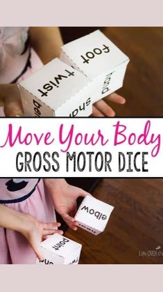 two children are playing with cross - motor dices and the words move your body across them