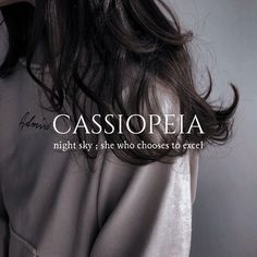 the back of a woman's head with her hair blowing in the wind and text cassisoreia