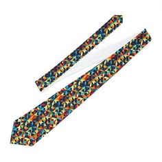 Stride into any room with confidence wearing this eye-catching mid-century modern necktie. Decked out in a sharp red, blue, and yellow geometric print, this tie adds a distinctive touch of vintage style to your modern-day ensemble! .: Material: 3.10oz/yd² (105gsm) polyester: it offers a silky soft satin finish along with a keeper loop for holding the tie tail. .: Length, in: 55.91, Width, in: 1.57 - 3.94 .: One sided print .: V-shaped end .: Keeper loop for securing tie tail .: Sewn in label Care instructions Do not wash; Do not bleach; Do not tumble dry; Iron, steam or dry: low heat; Dryclean. One Size Length, in 55.91 Width, in 1.57 - 3.94 Multicolor Office Ties, Multicolor Standard Tie For Father's Day, Adjustable Multicolor Standard Tie, Ties Mens Fashion, Blue And Yellow, Sew-in Labels, V Shape, Satin Finish, Geometric Print