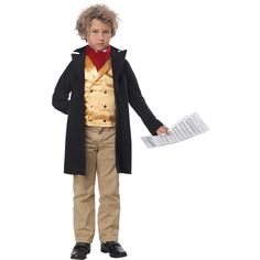 a young boy dressed in an old timey outfit and holding music sheets with his hands