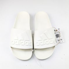 Adidas Unisex Adilette Logo Sandals, Creamy White, Size 12 Men's, 13 Women's, New With Tags White Synthetic Slides For Summer, White Synthetic Summer Slides, White Comfortable Adidas Slides, Adidas Slides For Summer, Adidas Summer Slides, White Non-slip Adidas Slides, Adidas White Sporty Slides, White Non-slip Synthetic Sandals, White Non-slip Flat Sandals