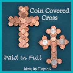 coin covered cross with the words paid in full