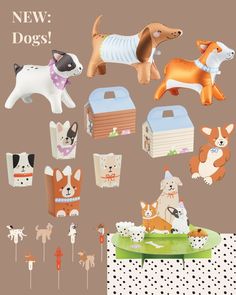 an assortment of dog paper toys on a table