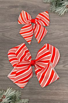 Red & white stripe print adds a fun pop to any look Big ribbon for sweet girly accent Alligator clip gives a secure fit Bow works for simple or dressy outfits Pick from 3" trendy or 6" for the perfect look Add cute detail to her everyday hairstyles with our Candy Cane Stripe Bows. These candy cane inspired bows make a versatile addition to her hair accessories, and is easy to match with any outfit. The girly bow comes attached to an alligator clip that makes it easy to clip into any hairstyle for easy styling. She can wear it with a range of hairstyles, from pigtails to ponytails, for sweet and simple accessorizing! bullets:Includes: Bow only Measurements are approximate! Candy Cane Bows, Sparkle In Pink, Candy Cane Stripes, Cheer Bows, Everyday Hairstyles, Dressy Outfits, Red And White Stripes, How To Make Bows, Stripe Print