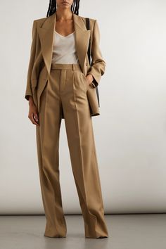 Living up to the brand's storied reputation, SAINT LAURENT's tailoring remains iconic in the hands of Anthony Vaccarello. Cut from wool-twill that'll last even longer if you dry clean it sparingly, these chic pants have exaggerated flared legs. Wear yours with tie-detailed blouses, classic stripes or the full suit with the matching blazer. Pleated Formal Pants, Office Look Skirt, Neutral Work Outfit Business Casual, Wide Leg Suit Women, Power Suits For Women Classy, Wealthy Women Fashion, Julia 1984, Hoi An Tailor Clothes, Flare Pants Outfit Classy