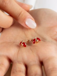 These 14k solid gold tiny ladybug earrings capture the elegance of the ladybug in a beautiful and unique piece of jewelry. Handcrafted in the finest detail, these earrings are made of 14k solid gold, making them both elegant and durable. The red enameled ladybug design adds movement to the earrings. The ladybug earrings are also sold as a pair. ✈️ We also understand the importance of timely delivery, that's why we ship within 1-3 business days of receiving your order. Your orders are shipped qui Ladybug Design, Ladybug Earrings, Ladybug Jewelry, Bug Jewelry, 20 Inch Necklace, Gold Hamsa, 16 Inch Necklace, Steampunk Accessories, Bird Earrings