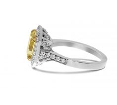 a yellow and white diamond ring