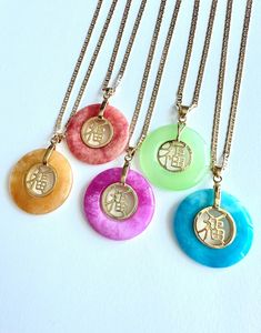 - 18K Gold plated jade circle pendant - The Chinese character 'Fu' means good luck, good fortune - 18K Gold filled, 2.5mm thick mariner chain, choose length in menu **Jade is a natural stone, so please allow for slight differences in the shade of colors** Donut Necklace, Green Jade Necklace, Jade Necklace, Chinese Characters, Green Jade, Good Fortune, Circle Pendant, Gold Plated Jewelry, Jewelry Plate