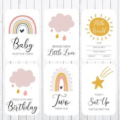 four baby shower gift tags with rainbows and clouds