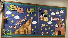 a bulletin board is decorated with mario and luigi's castle, which reads level up