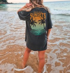 This Sun Seeker Tee is a beach lover's dream, featuring a stunning sunset design that evokes feelings of serenity and wanderlust. Whether you're strolling along the shoreline or sipping cocktails on a tropical getaway, this sunset-inspired t-shirt is the perfect companion for your girls trip or vacation. With its aesthetic appeal and comfortable fit, it makes a thoughtful gift for anyone who cherishes the magic of sunsets and seeks adventure in every moment. Printed on Comfort Colors Tee ****PLE Shirt Festival Outfit, Forever Chasing Sunsets, Hippie T Shirt, Sunsets Beach, Ocean Shirt, Chasing Sunsets, Oversized Tees, Oversized T Shirt Dress, Beach Tee