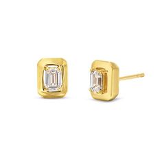 These Emerald Gold Frame Solitaire Stud Earrings feature emerald cut diamonds totaling approximately 0.43 carats framed in 18K yellow gold. Luxury Yellow Gold Emerald Cut Diamond Earrings, Gold Baguette Cut Diamond Earrings With Vvs Clarity, Gold Emerald-cut Diamond Earrings, Formal Yellow Gold Emerald Cut Diamond Earrings, Yellow Gold Diamond Rectangular Earrings, Emerald Cut Diamond Earrings In Yellow Gold, Elegant Yellow Gold Emerald-cut Diamond Earrings, Gold Emerald Cut Diamond Earrings With Prong Setting, Emerald Cut 14k Yellow Gold Earrings