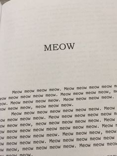 an open book with the word meow written in it's center and surrounded by other words