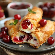 cranberry and cheese pastries on a plate