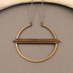 Equinox geometric brass circle necklace with gunmetal chain | Etsy Modern Everyday Brass Necklace, Minimalist Gunmetal Metal Necklace, Modern Hand Forged Brass Necklace, Modern Bronze Brass Necklace, Minimalist Circle Brass Necklace, Boho Design, Boho Designs, Inspired Jewelry, Circle Necklace