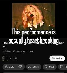 a woman singing into a microphone with the caption'this performance is actually heart breaking '