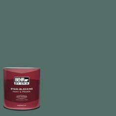 a can of behr paint on a green background with the words stain - blocking