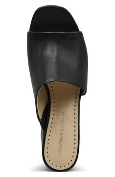 An asymmetrical strap creates a unique touch on this classic open toe mule. 3.5" heel Open toe Asymmetrical vamp Slip-on Block heel Manmade upper, lining, and sole Imported Chic Slip-on Open Toe Heels, Chic Medium Width Slip-on Slingback Pumps, Modern Slip-on Evening Heels, Modern Slip-on Heels For Evening, Chic Slip-on Block Heel Heels, Chic Slip-on Heels With Sculpted Heel, Slip-on Heels With Sculpted Heel For Evening, Elegant Slip-on Open Toe Heels, Sculpted Heel Slip-on Heels For Evening