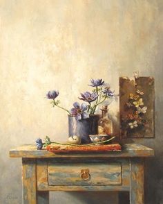 a painting of blue flowers on a table