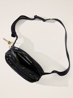 FOR: Commuting, work, and travel FEEL: Sleek with subtle shine FAVE: Adjustable and detachable straps for personalized fit and carry Dimensions: 7" x 2" x 4 1/2".. Large Belt Bag, Large Belt, Work And Travel, Bra Dress, Belt Bag, Dress Accessories, Garnet, Gift Card, Sleek