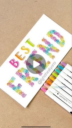 the best dad ever greeting card is next to six colored crayon pencils