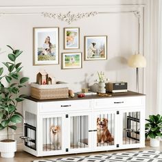 a living room with pictures on the wall and two dogs in their kennels