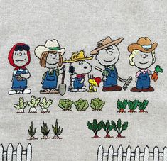 a group of people that are standing in the dirt with some plants and vegetables on them