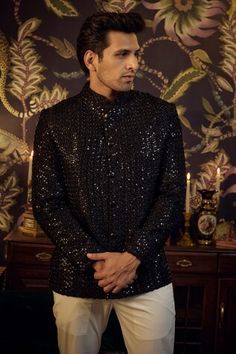 Black silk short sherwani with cutdana embroidery. - Aza Fashions Diwali Party Bandhgala With Chikankari Embroidery, Eid Party Bandhgala With Chikankari Embroidery, Diwali Party Sherwani With Chikankari Embroidery, Ceremonial Sherwani With Mirror Work For Diwali, Short Sherwani For Men, Short Sherwani, Cutdana Embroidery, Sherwani For Men, Silk Shorts