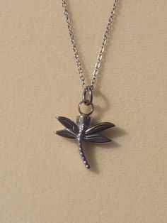 Silver Dragonfly Cremation Urn Necklace comes with everything needed to help you get the ashes into the urn.  Comes on your choice of a 16, 18, 20, 22, 24, or 26 inch stainless steel chain.  Both chain and urn are stainless steel. Ashes Necklace, Cremation Necklaces, Urn Jewelry, Urn Necklace, Urn Necklaces, Search Bar, Cremation Jewelry, Cremation Urns, Memorial Jewelry