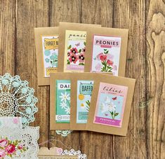 some cards and doily on a wooden table