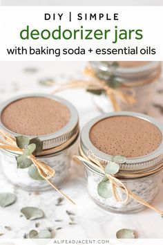 two small jars filled with baking soda and essential oils