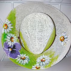 ♥Hand Painted Violets & Daisies Hat, Hanpainted Hat, Violets Sunhat, Hanpainted Floral Hat, Daisies Summer Hat, Flowers Hat, Floral Summer Hat♥ HAND PAINTED HAT by DiqnaDesign. ------- SIZE & DETAILS ------- Unique handpainted product Professionally hand-painted with lots of love. Measures: Brim Size: 37 cm ≈ 14.5 inches Diameter of the hole (head circumference): 19 cm ≈ 7.4 inches Material: Paper Straw All hats are hand painted with professional textile paint Because these are Original Handmade White Fedora For Spring, Hand Painted White Brimmed Hat, Artistic White Brimmed Hat, Handmade White Sun Hat Cap, Handmade White Sun Hat, White Artisan Hand Painted Hats, Handmade Straw Cap Hat For Spring, Handmade Spring Straw Cap Hat, Handmade Artistic Straw Hat For Spring