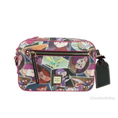 Style: Dooney & Bourke Disney Rescuers Small Camera Crossbody Bag Material: Coated Canvas and Leather Features: Adjustable/Detachable Crossbody Strap, Fabric Lined, Inner Slip Pockets Measures: 8.5" W x 5.75" H x 3" D MSRP: $228 Color: Purple.  Gender: female.  Age Group: adult. Paw Wallpaper, The Rescuers, Dooney And Bourke Disney, Disney Items, Dooney & Bourke Bag, Cat Sketch, Disney Handbags, Small Camera, Disney Bag