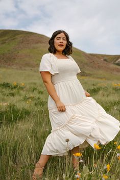 Needing the perfect Summer dress? Look no further than our collection of short sleeve dresses. Our Ophelia dress specifically is meant for hot weather days while still being fashionable.    #styleinspiration #fashiondresses #chicoutfits Modest Square Neck Dress With Ruffles, Beige Flowy Square Neck Dress, Daytime Square Neck Ruffle Dress, Cream Midi Dress With Square Neck For Garden Party, Cream Flowy Flutter Sleeve Dress, Cream Flowy Dress With Flutter Sleeves, Cream Flutter Sleeve Dress For Brunch, Flowy Cream Dress With Flutter Sleeves, Cream Square Neck Midi Dress For Garden Party