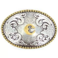 This belt buckle by M&F Western Products is made to make you look sharp! This is a very nice belt buckle that fits most size belts and has your traditional belt loop fastener that is easy to slide on and off. This buckle is made to shine up your outfit! Put this on your favorite leather belt and you will be ready to make your best impression. This M&F buckle is made with silver and is with detailed engraving that makes this buckle unique. Traditional Belt, Mens Accessories Necklace, Nocona Belt, Gold Belt Buckle, Cowboy Belt Buckles, Mens Gemstone Rings, Nice Belts, Mens Rings Fashion, Cowboy Belt