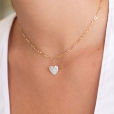 Our newest long & short chain paired with a delicate mother of pearl heart or flower charm. Perfect to gift or wear. Long & short chain made with 14k gold fill. Available with a 16 or 18 inch chain and secure spring ring clasp. Layer up with your other fave chains or wear solo as the perfect everyday necklace. Every Jewel Ya design arrives in our signature acrylic container for storage and safekeeping. Contact us with any questions – we’re here to help. Delicate Heart Pendant Jewelry With Pearl Charm, Dainty Paperclip Chain Necklace For Wedding, Delicate 14k Gold Filled Heart Charm Necklace, Dainty Heart Necklace With Pearl Charm As Gift, Delicate 14k Gold Filled Heart Pendant Charm Necklace, Dainty White Heart Necklace With Delicate Chain, Delicate Heart Necklace With Pearl Charm, Dainty Heart Necklace With Pearl Charm For Gift, Delicate Pearl Charm Heart Pendant Jewelry