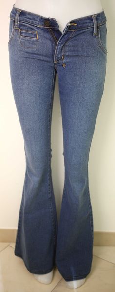 "18th Amendment 'Harlow' ladies vintage blue denim flared jeans-Waist 24\"-circa 1990s-Weight 584g-FREE postage The jeans are made of 98.4% Cotton and 1.6% Elastane The jeans are used but in excellent condition with the following approximate measurements: Overall length (edge to edge): 109cm (from behind); Waist (flat front): 36cm; Hips (flat front): 40cm; Length (inside leg): 86cm; Flare width (edge to edge): 32cm FREE POSTAGE WORLDWIDE" Casual Blue Full-length Flares, Casual Full-length Blue Flares, Casual Blue Full Length Flares, Casual Full Length Blue Flares, Casual Denim Blue Flared Hem Jeans, Casual Straight Leg Blue Flares, Casual Blue Flares With Flared Hem, Casual Medium Wash Flare Jeans With Flared Hem, Casual Medium Wash Jeans With Flared Hem