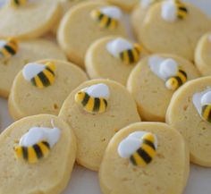 some cookies with yellow and black designs on them