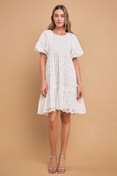 This Knit and Embroidery Combo Dress provides a truly timeless look. It features a round neckline short puff sleeves and scalloped hem detailing for a touch of elegance. This dress offers classic style and timeless appeal that looks great for any event. Round neckline Short puff sleeves Back neck button closure Scalloped hem Lined Hand wash cold Do not bleach Do not tumble dry Iron low Shell: 100% Cotton Contrast: 75% Polyester 25% Acrylic Lining: 100% Cotton Exclusive of Decoration Exclusive of Mom Apparel, Effortless Chic Style, Combo Dress, Grad Pics, Halloween Snacks, Tiered Midi Dress, Poplin Dress, Striped Midi Dress, Pleated Midi Dress