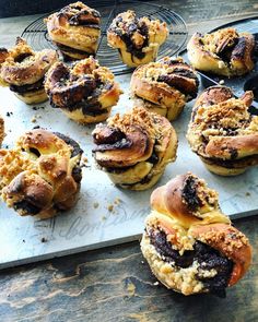 several pastries sitting on top of a metal tray