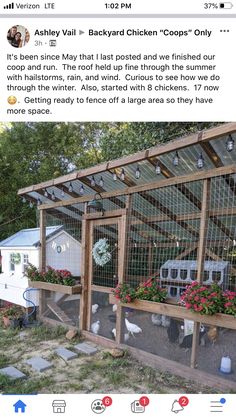 a chicken coop with flowers in it and an advertise for the company's website