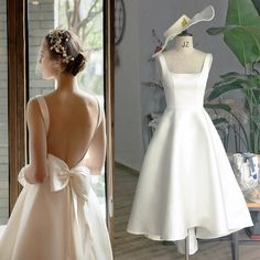 the back of a woman's wedding dress in front of a mannequin