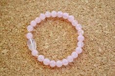 "Solid 14 Karat Gold Bead/Natural Rose Quartz Pink Crystal Pi Yao/Pixiu Bracelet Approximately 6 mm Round Natural Rose Quartz beads Approximately 13x9mm Natural Rose Quartz Pixiu Approximately 3mm Real Solid Gold Bead Stretchy Bracelet Buying For Someone Special: Average size for Women 7 \" / Men 8\" Products and photo may differ. Includes storage bag ROSE QUARTZ ~ Pink Quartz or the stone of unconditional love is the most highly revered and desired stone of the quartz group because it is believ Pink Stretch Bracelet With Natural Stones For Meditation, Pink Round Beads Stretch Bracelet For Meditation, Round Rose Quartz Crystal Bracelet For Relaxation, Rose Quartz Crystal Bracelet For Meditation, Pink Beaded Crystal Bracelet For Meditation, Dainty Pink Rose Quartz Beaded Bracelets, Pink Rose Quartz Stretch Bracelet With Natural Stones, Rose Quartz Round Crystal Bracelet For Meditation, Elegant Rose Quartz Crystal Bracelet For Meditation